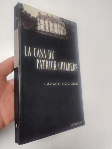 Portada del libro de La casa de Patrick Childers (dedicado por el autor)