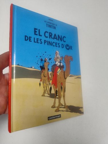 Portada del libro de El cranc de les pinces d'or. Les aventures de Tintín