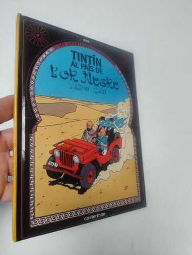Portada del libro de Tintín al país de l'or negre
