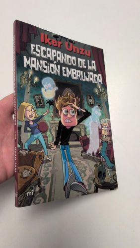 Portada del libro de Escapando de la mansión embrujada